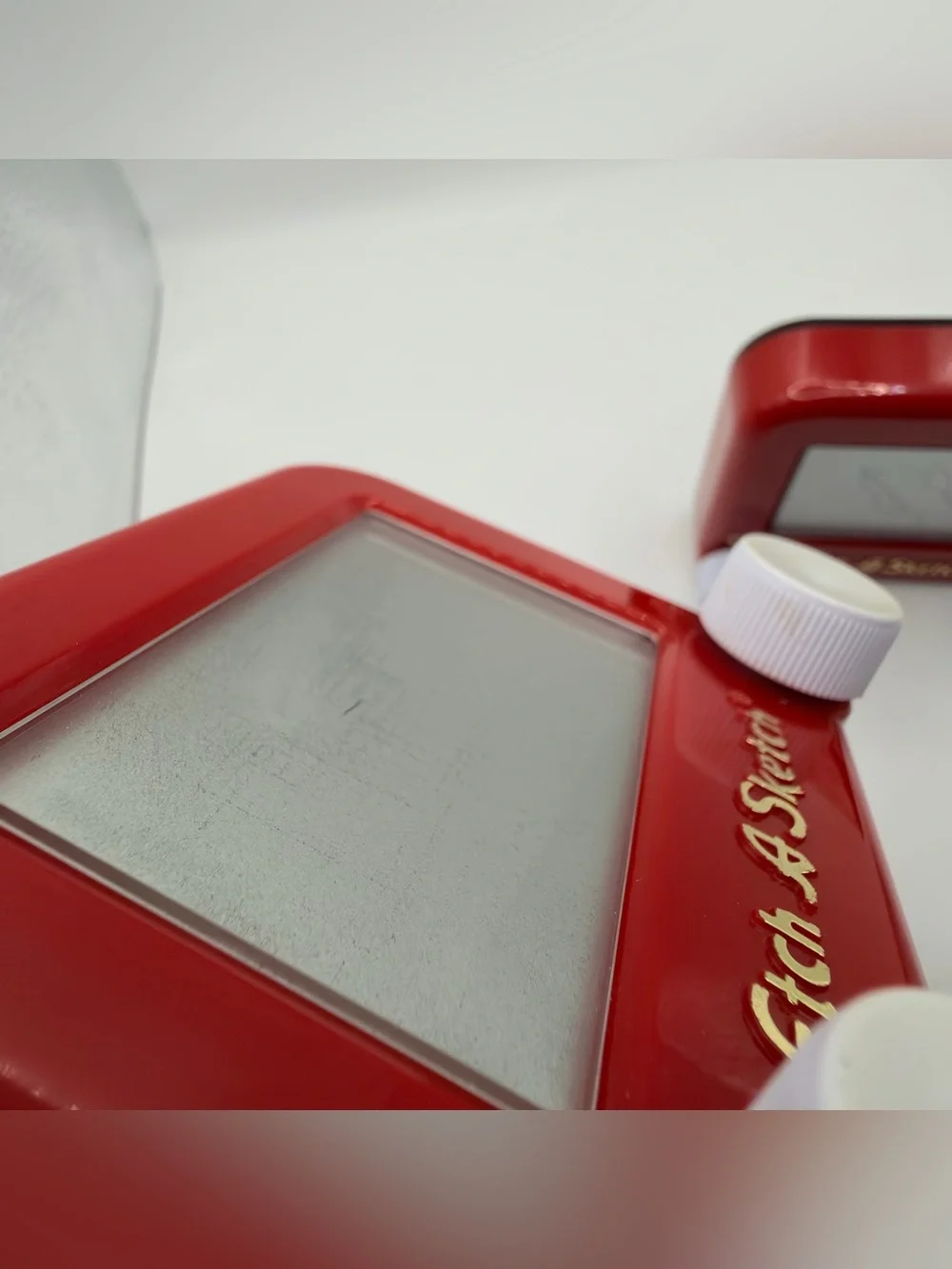 Pair of Mini Classic Red etch a Sketch toys